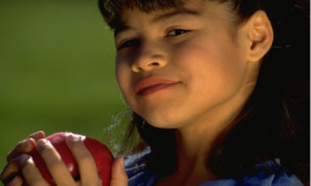 Girl holding apple